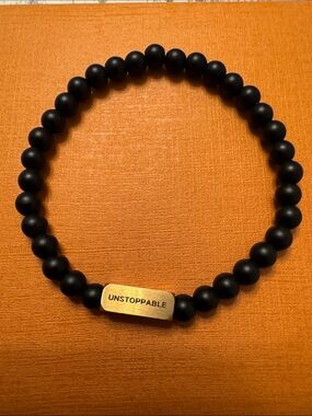 Unstoppable Black Beaded Bracelet with Gold Bar
